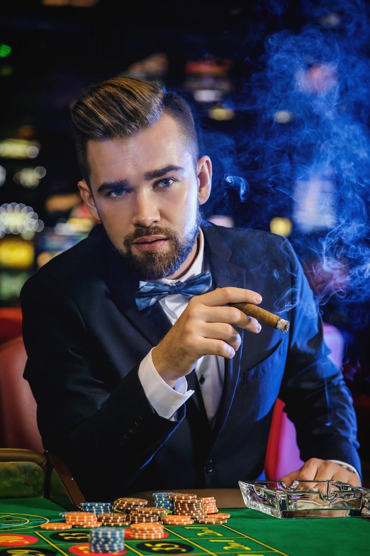 Meja blackjack live di sadabet138 dengan dealer dan pemain di studio multi-kamera